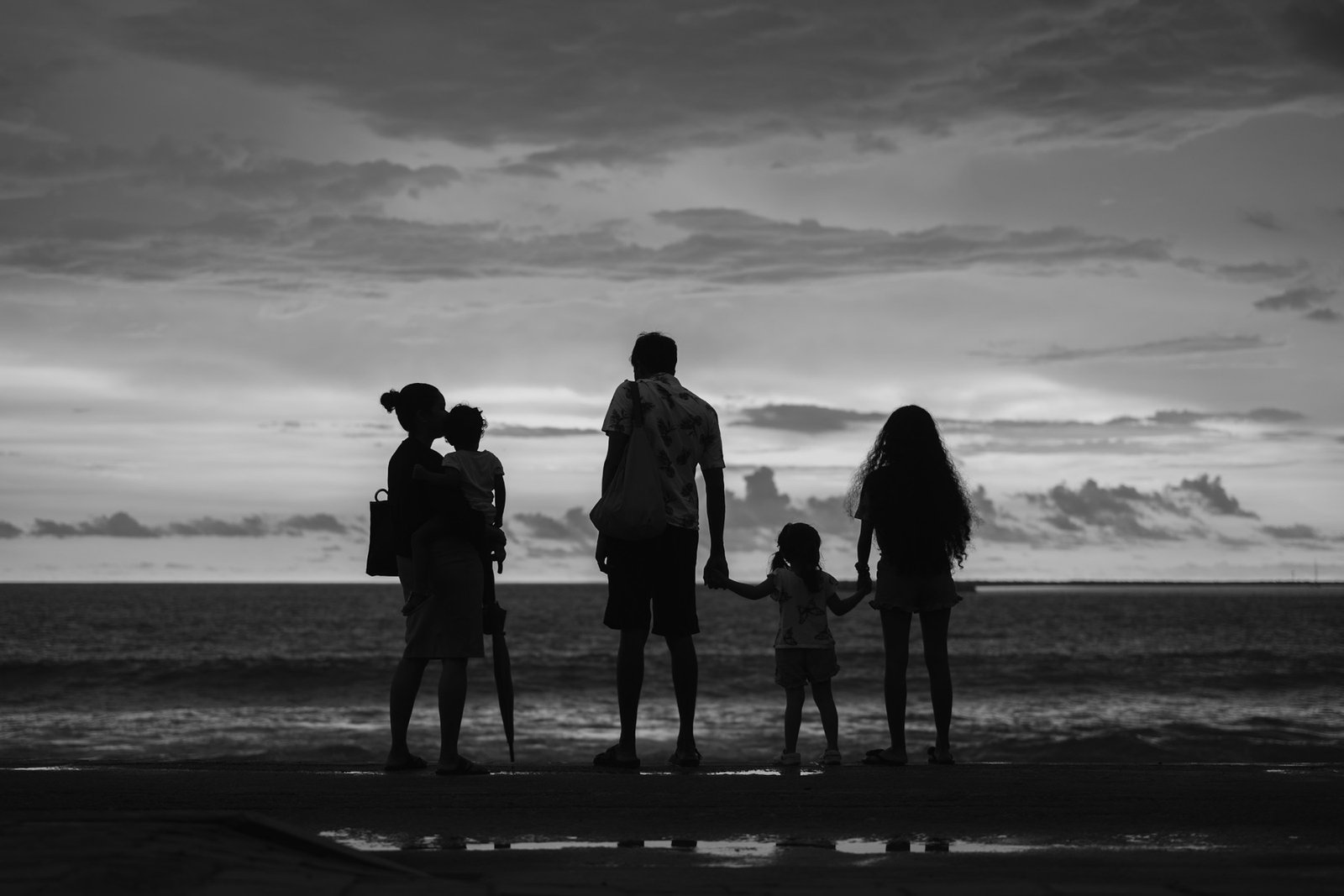 Family together by the water